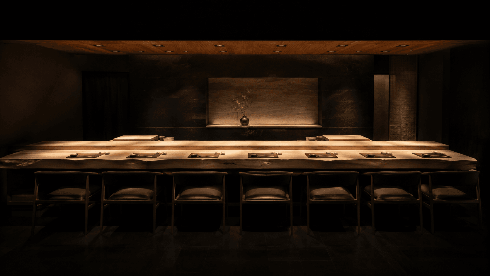 An empty hinoki cypress counter set for service