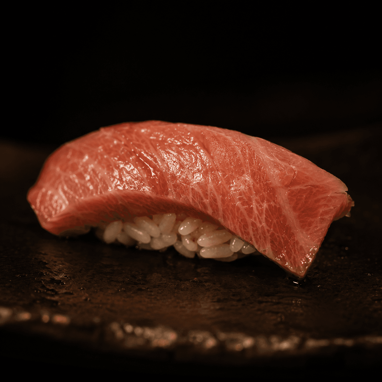 Ōtoro nigiri, glistening